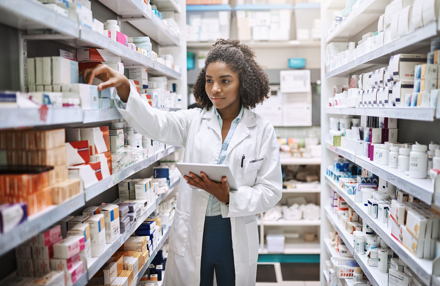 pharmacist viewing medication