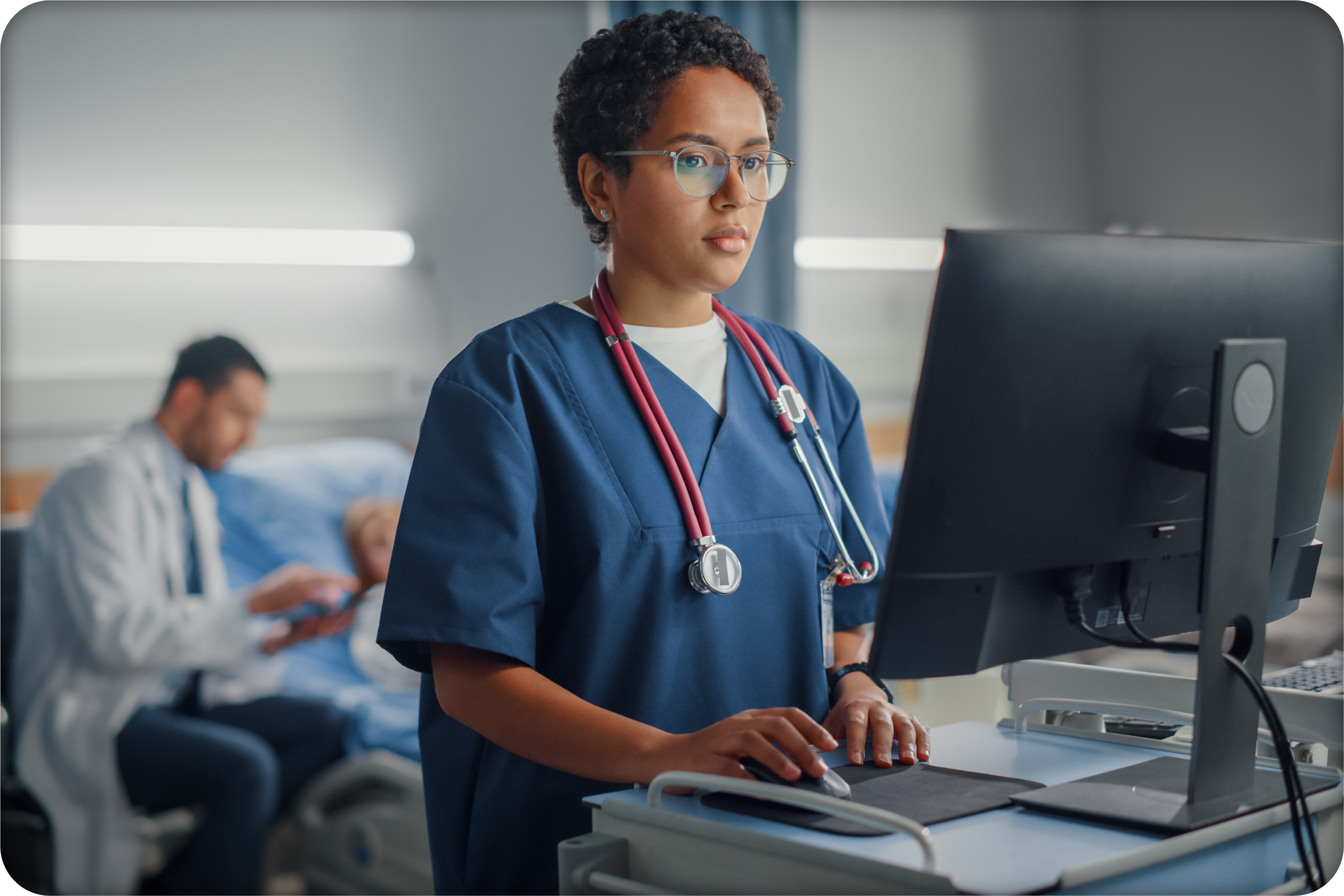 Clinician using computer in a hospital setting