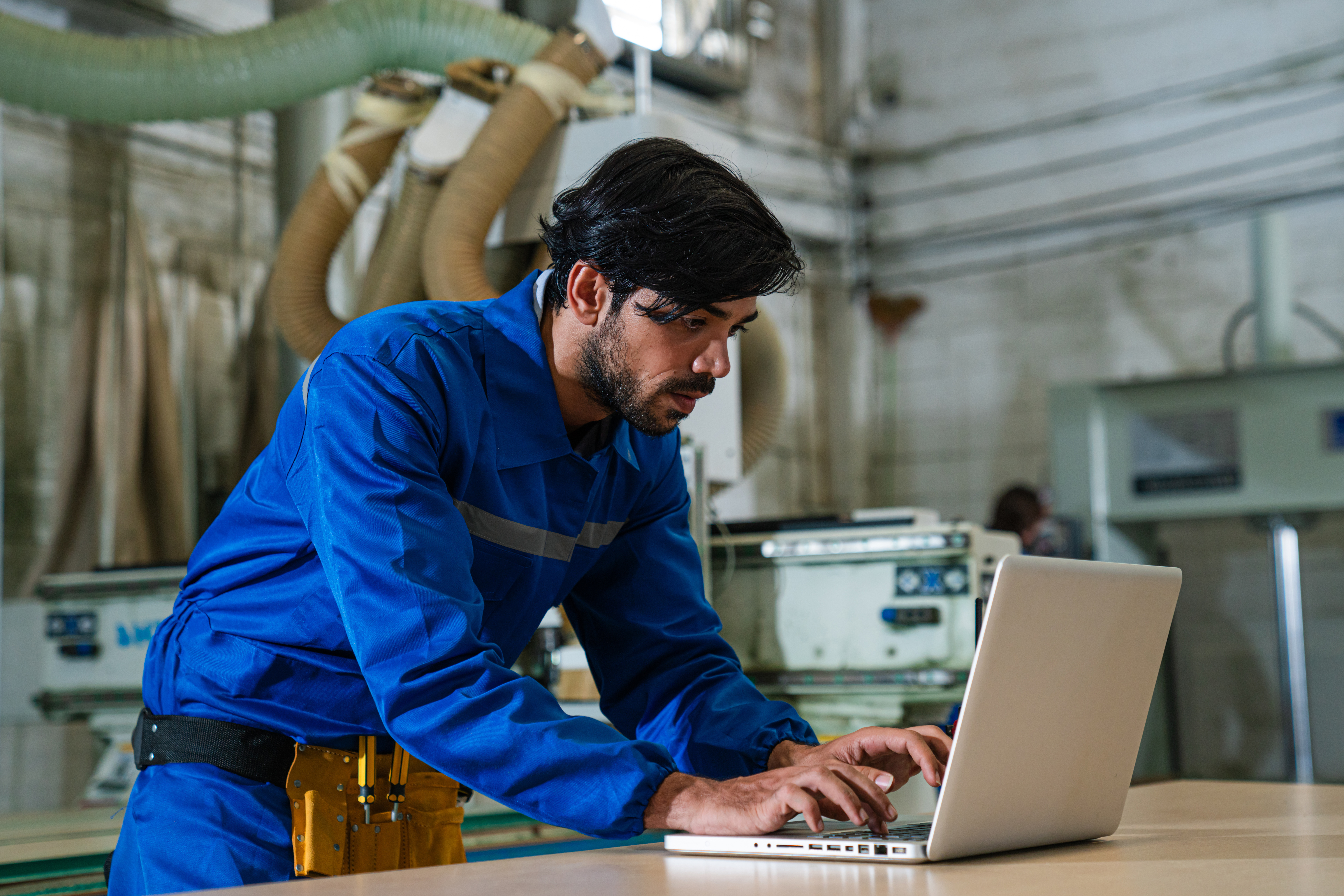 Technician using laptop