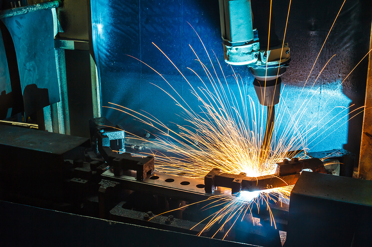 CNC machine with sparks flying