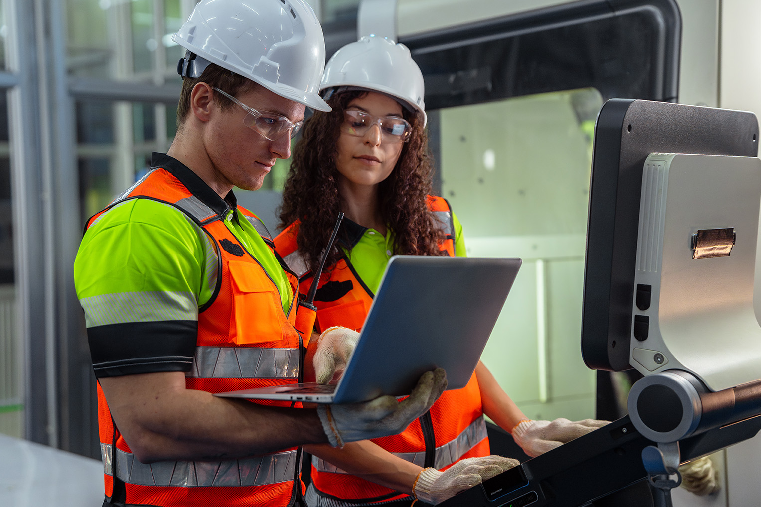Warehouse workers using kiosk