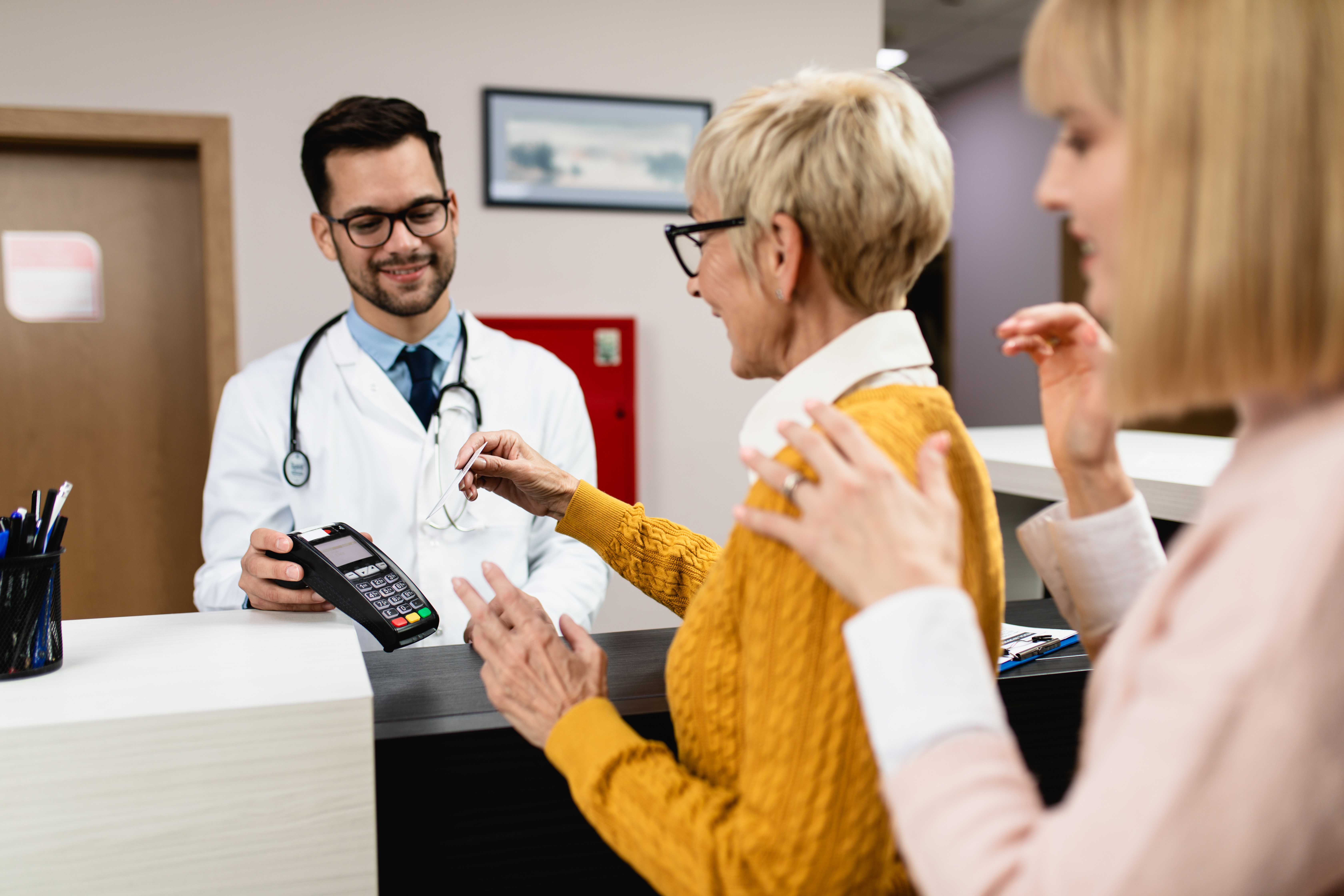 Photo of patient paying at hospital