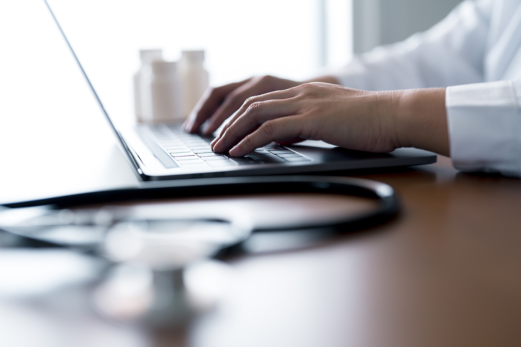 Medical person with laptop