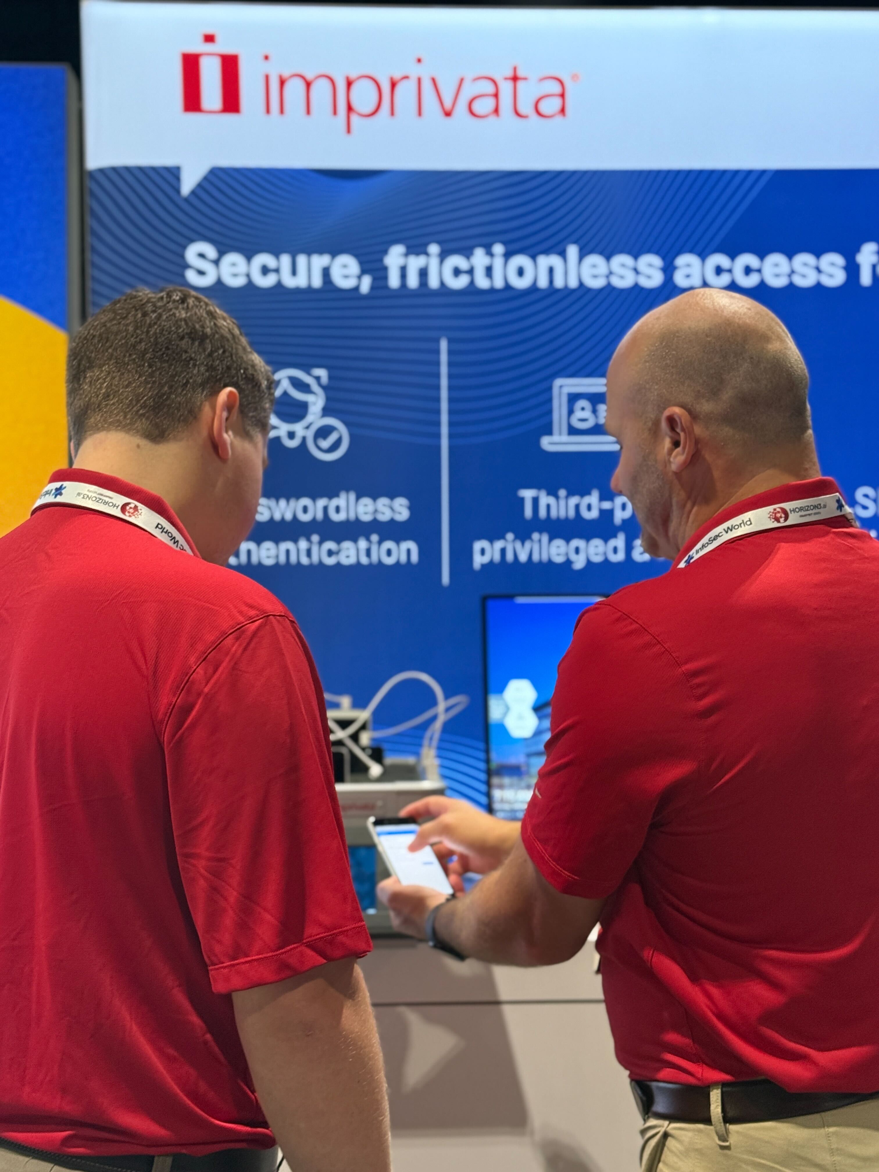 Photo of Imprivata representatives demonstrating products