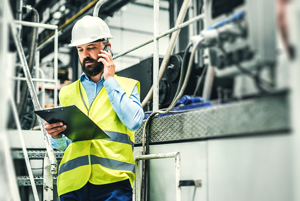 Photo of man working on manufacturing floor