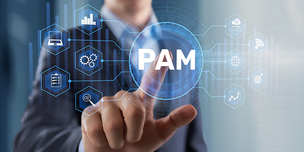 Employee pressing button on hologram overlay depicting PAM Privileged Access Management infrastructure with identity control and secure access workflows for enterprise cybersecurity systems