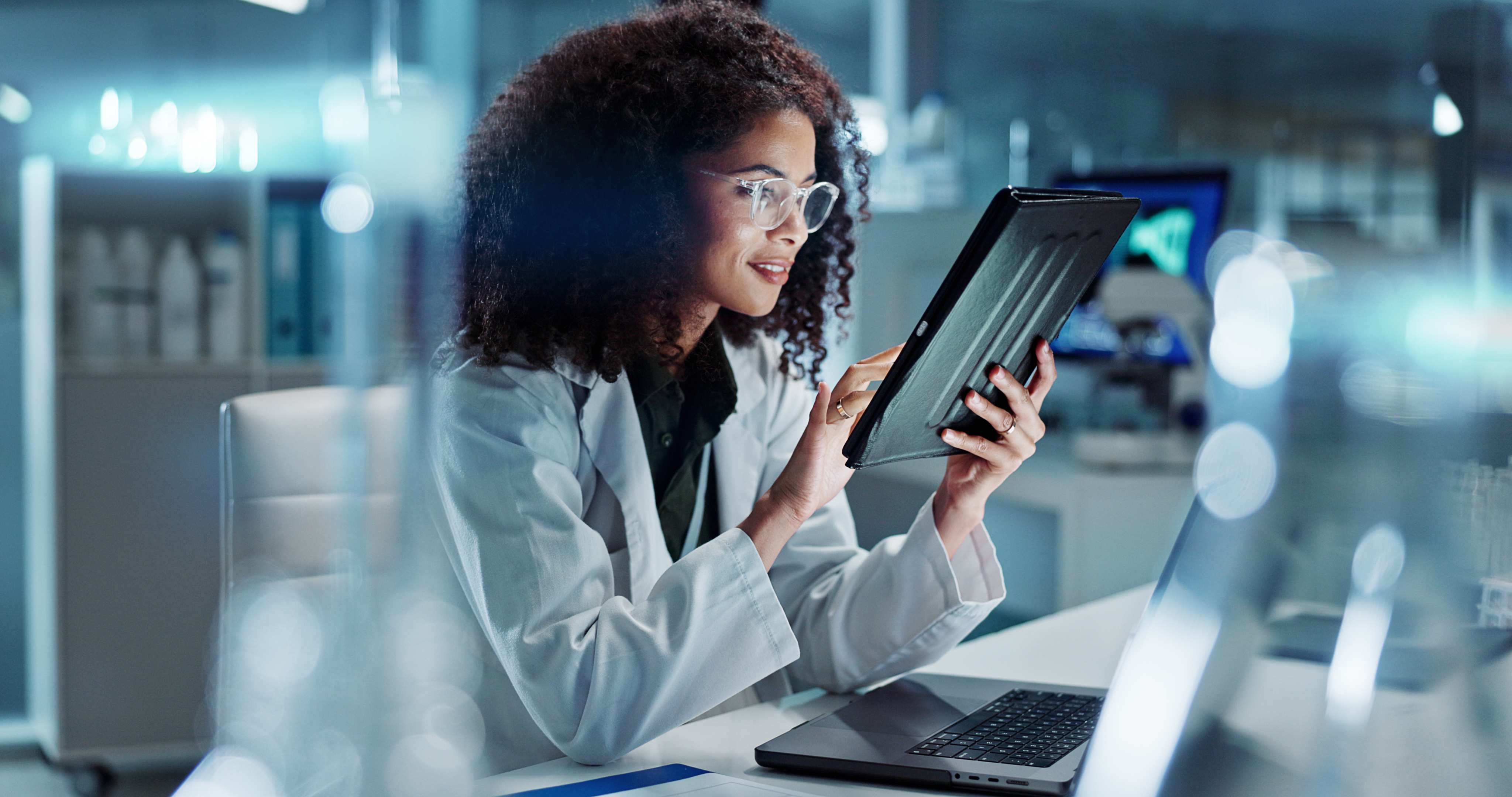 Doctor checking tablet device