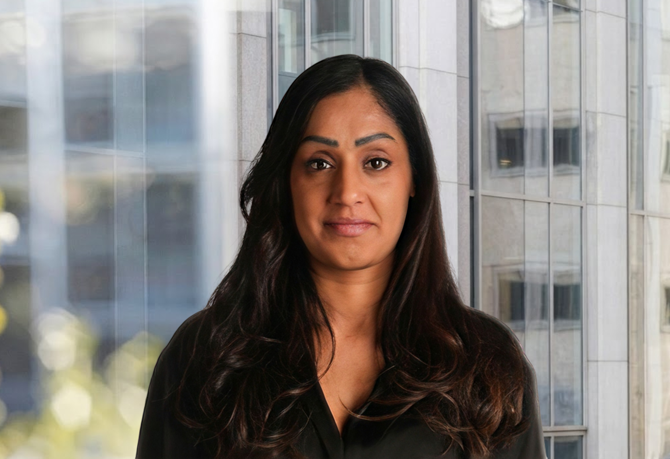 Headshot of Raz Edwards with Branded background
