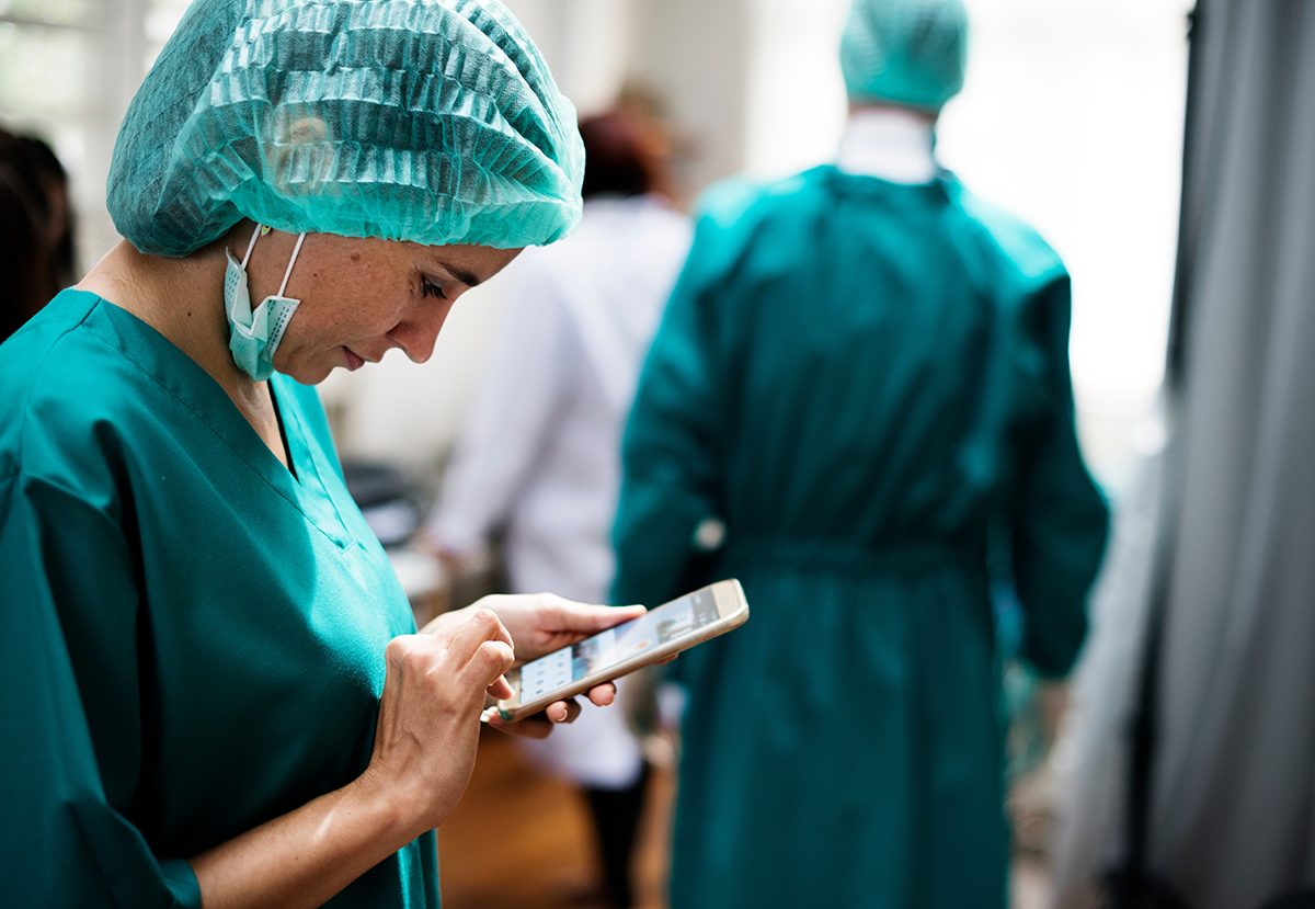 Clinician using mobile device